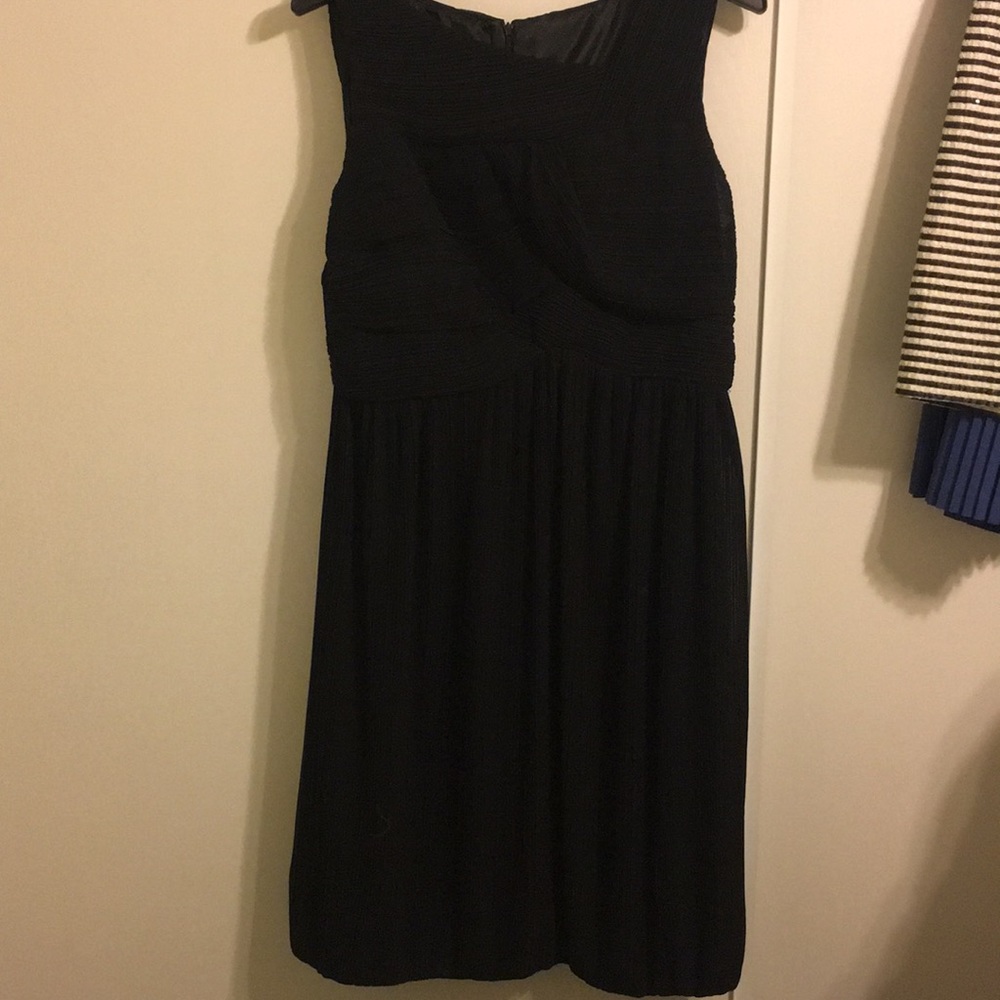 Black pleated bubble hem dress